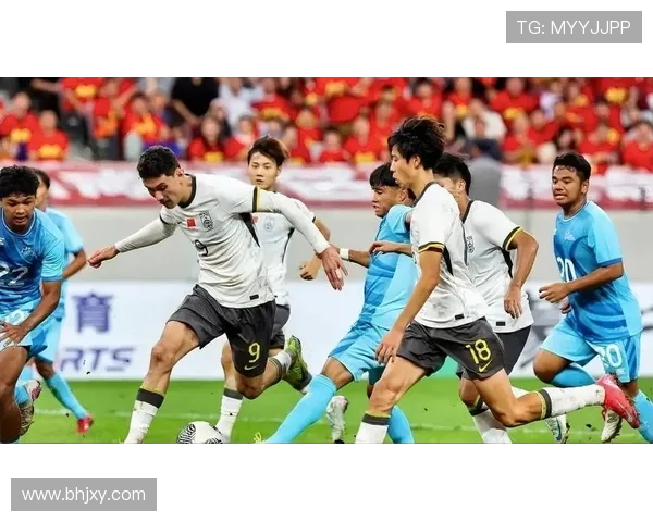 国足再度鏖战亚洲杯小组赛逆转取胜展现强劲拼搏精神